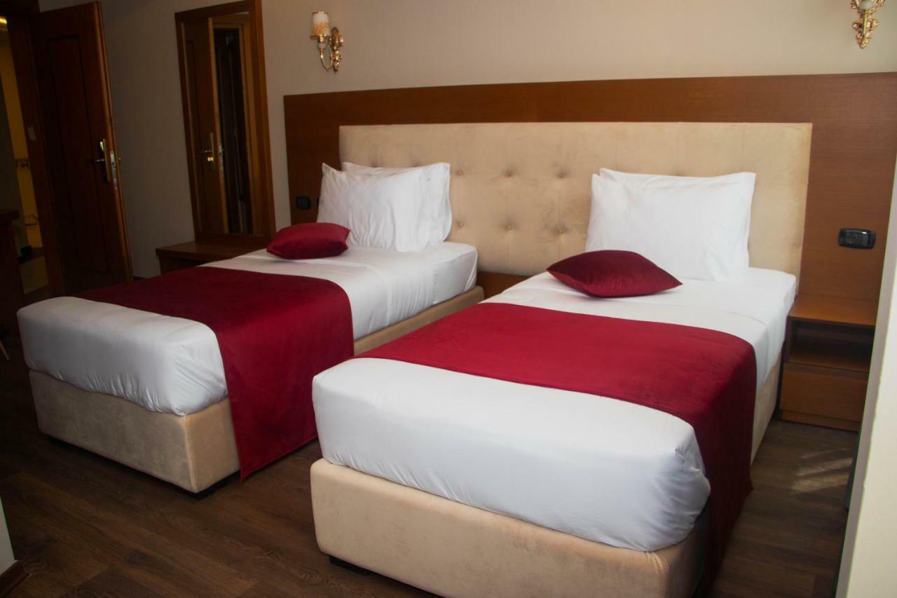 Albanopolis Hotel Tirana Bagian luar foto